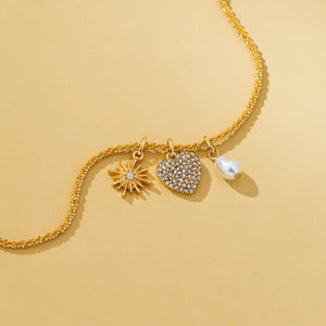 Gold Celestial Heart & Pearl Charm Necklace
