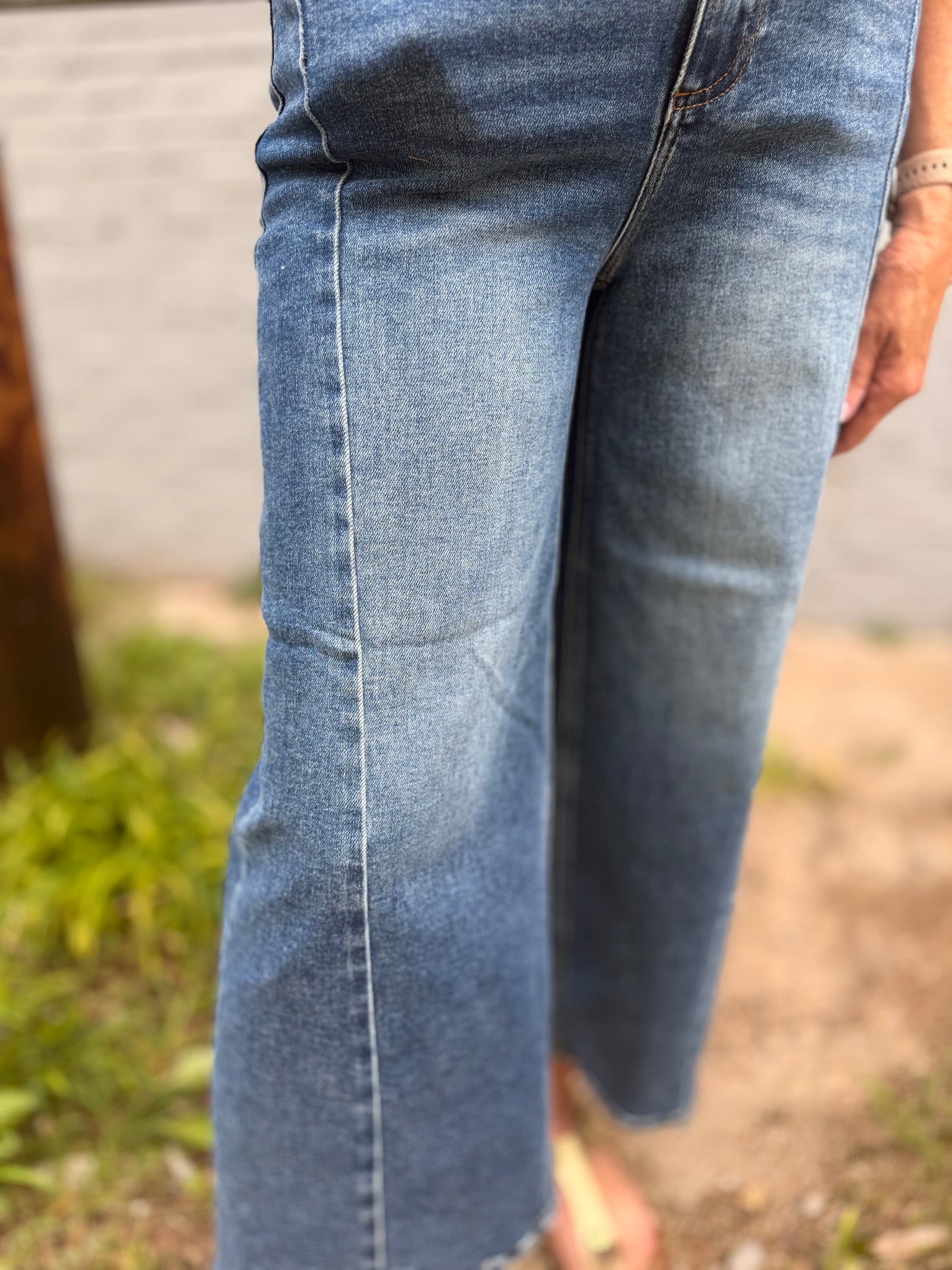 Risen Dark Wash High Rise Step Hem Jeans