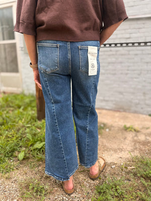 Risen Dark Wash High Rise Step Hem Jeans