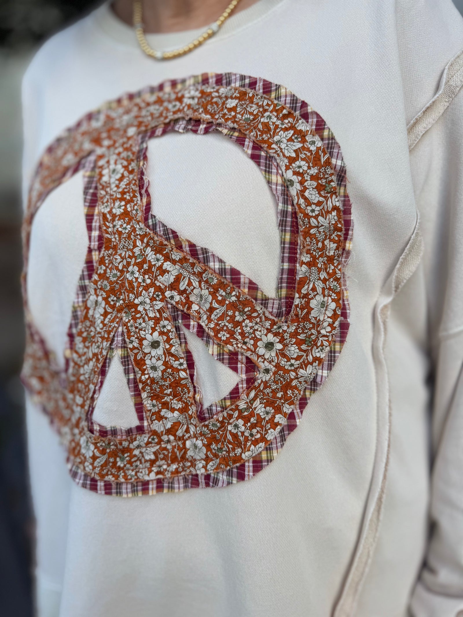 Bone Patchwork Floral Peace Sign Sweatshirt