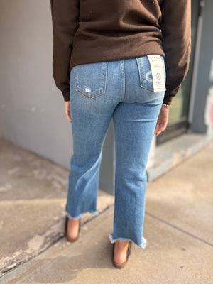 Risen High Rise Medium Wash Straight Leg Frayed Hem Jeans