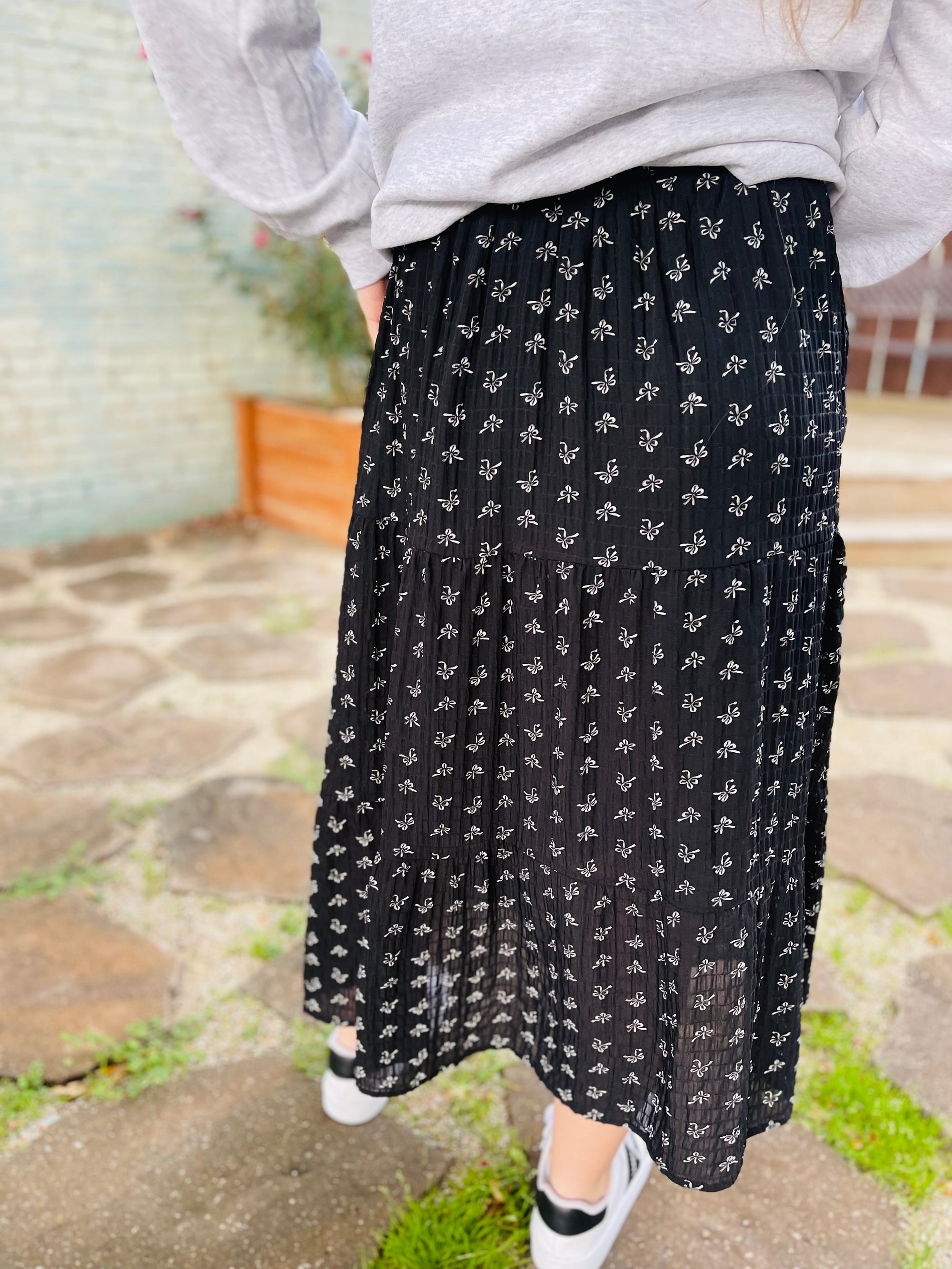 Black Bow Print Tiered Maxi Skirt