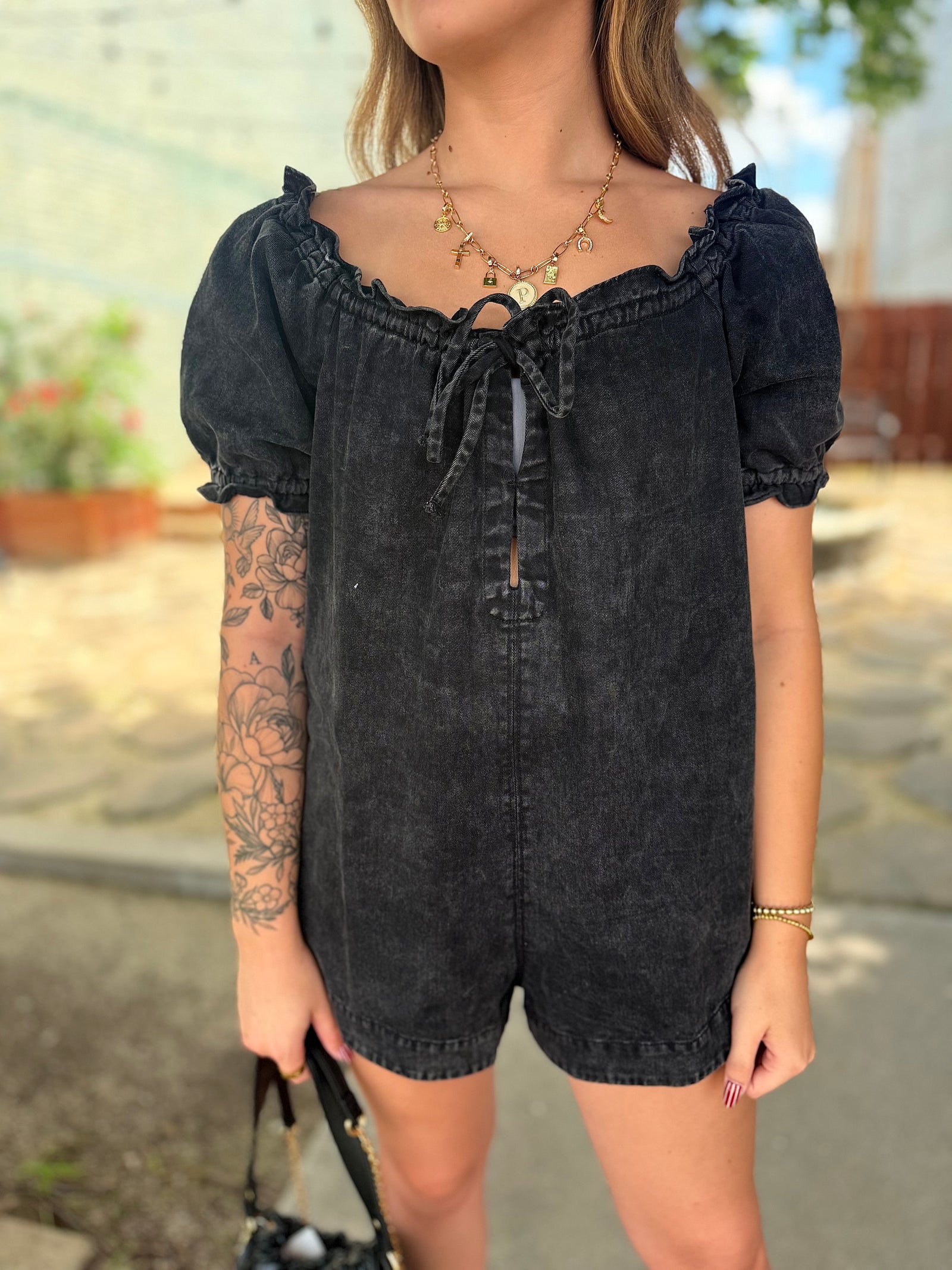 Olivaceous Ruffled Edge Washed Black Romper