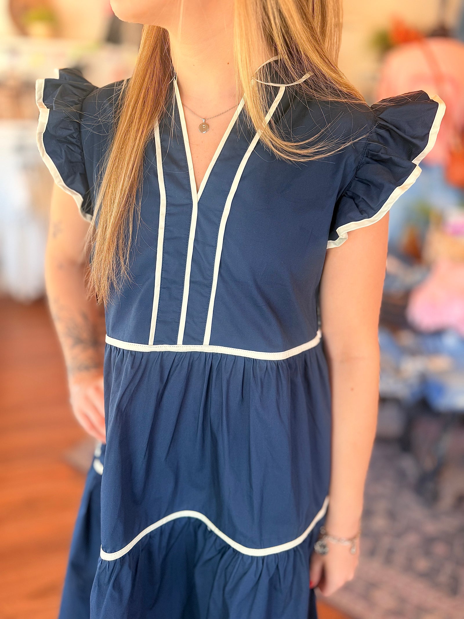 Navy Ruffle Sleeve Tiered Dress w/ White Piping Detail
