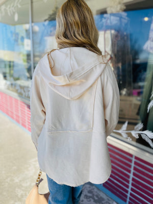 Ivory Exposed Seam Half Button Hooded Knit Top