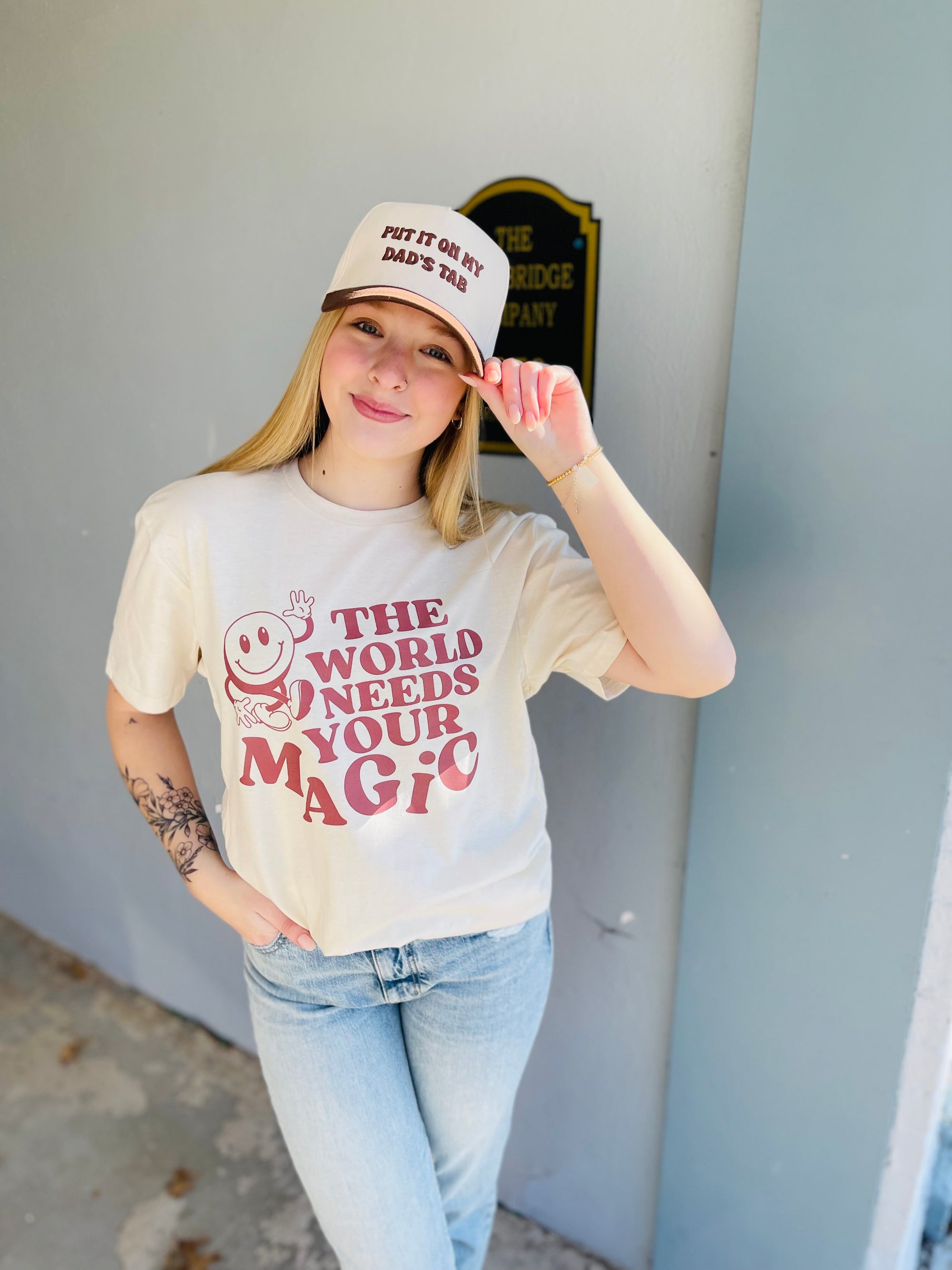 Cream The World Needs Your Magic Graphic T-Shirt