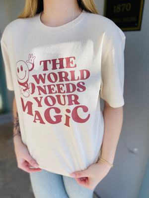 Cream The World Needs Your Magic Graphic T-Shirt